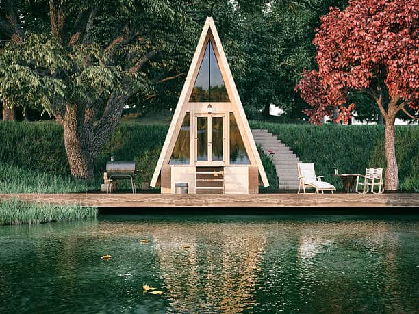 Lake side wooden triangle house