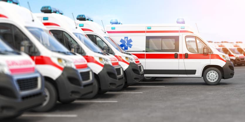 Ambulance cars in a row on a parking